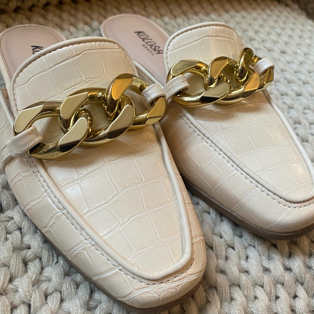 White / Cream mules with gold chain detail